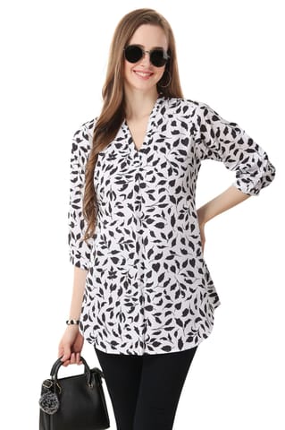Fashionable Faux Crepe Tunic Featuring A Bold Black And White Print By Bloomkart
